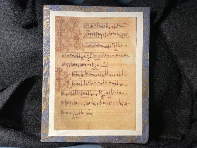 Photo showing a sheet of music from the box museum